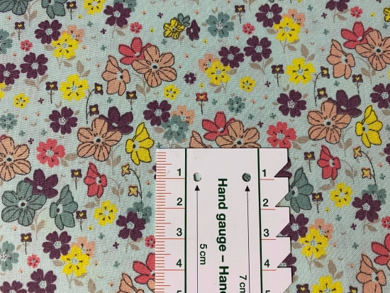 Baumwolle Webware kleine bunte Blumen auf mint